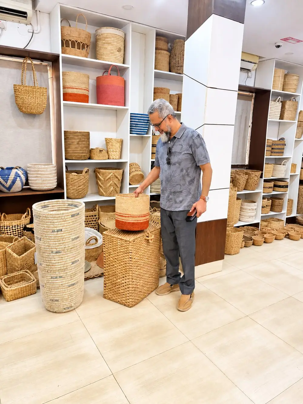 RES Eco-Craft showroom shelves filled with handwoven seagrass and water hyacinth baskets